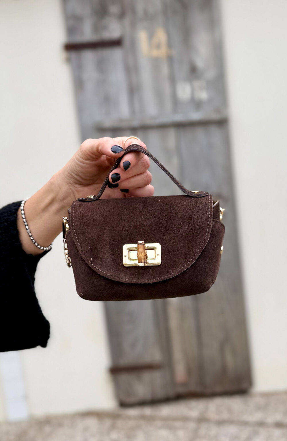 MINI BORSA IN PELLE CON TRACOLLA A CATENA