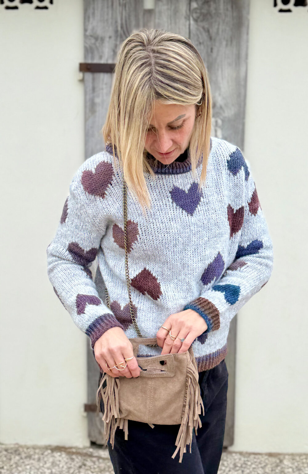 MINI BORSA IN PELLE CON FRANGE E TRACOLLA A CATENA